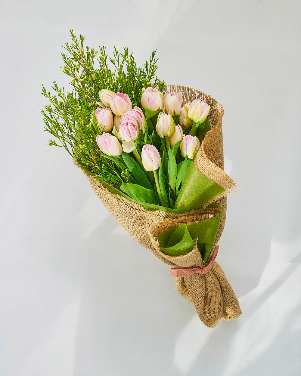 Heavenly Tulips bouquet with vibrant pink tulips. Sydney florist creation perfect for birthdays and surprises.