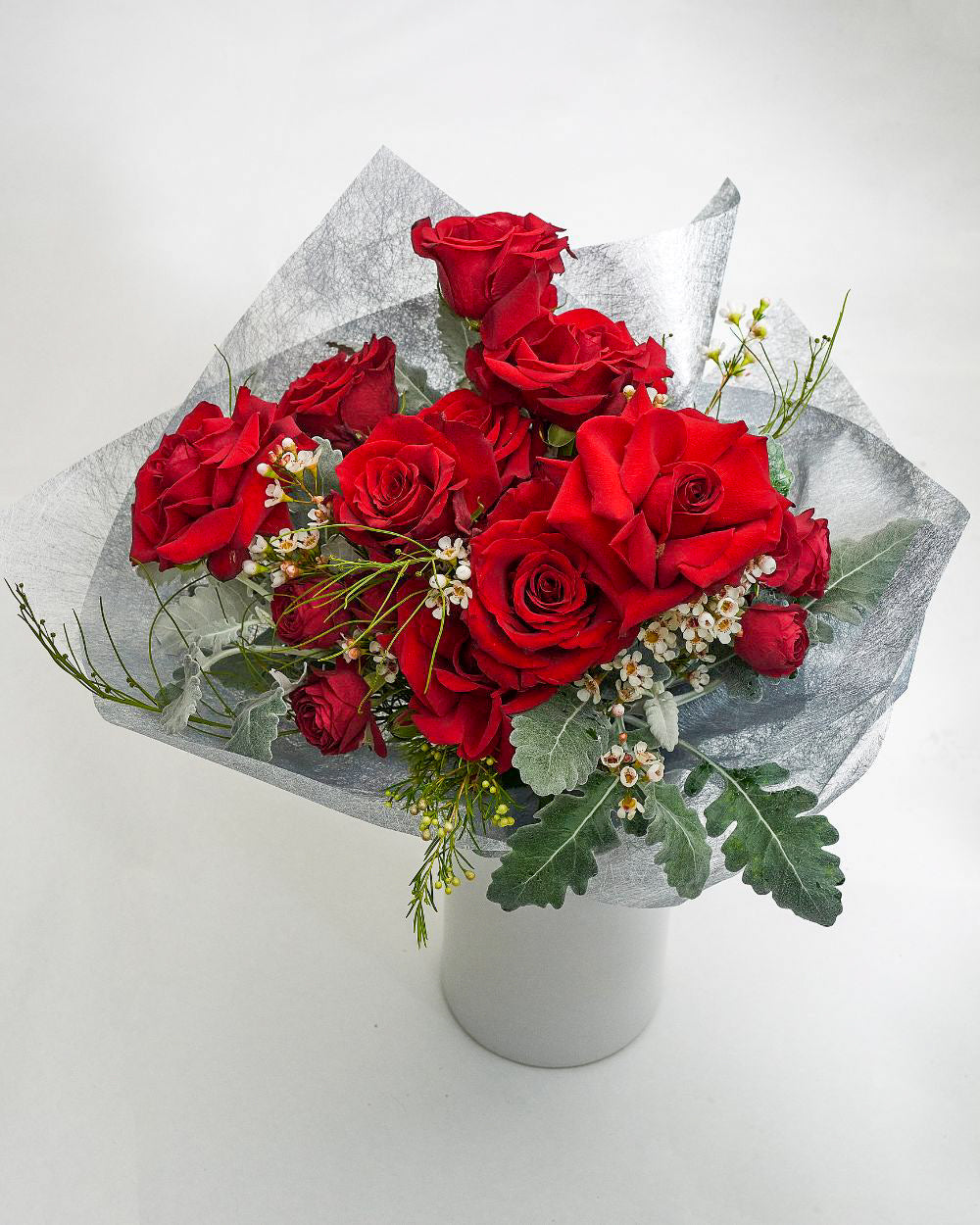 Classic red rose bouquet in vase – romantic gift from Sydney florist, ideal for anniversaries.